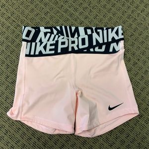 Nike pro women’s 5’  Innertwist training shorts size Med Pink and black